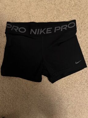 Nike Pro Women's Black Athletic Compression Shorts with Branded Waistband